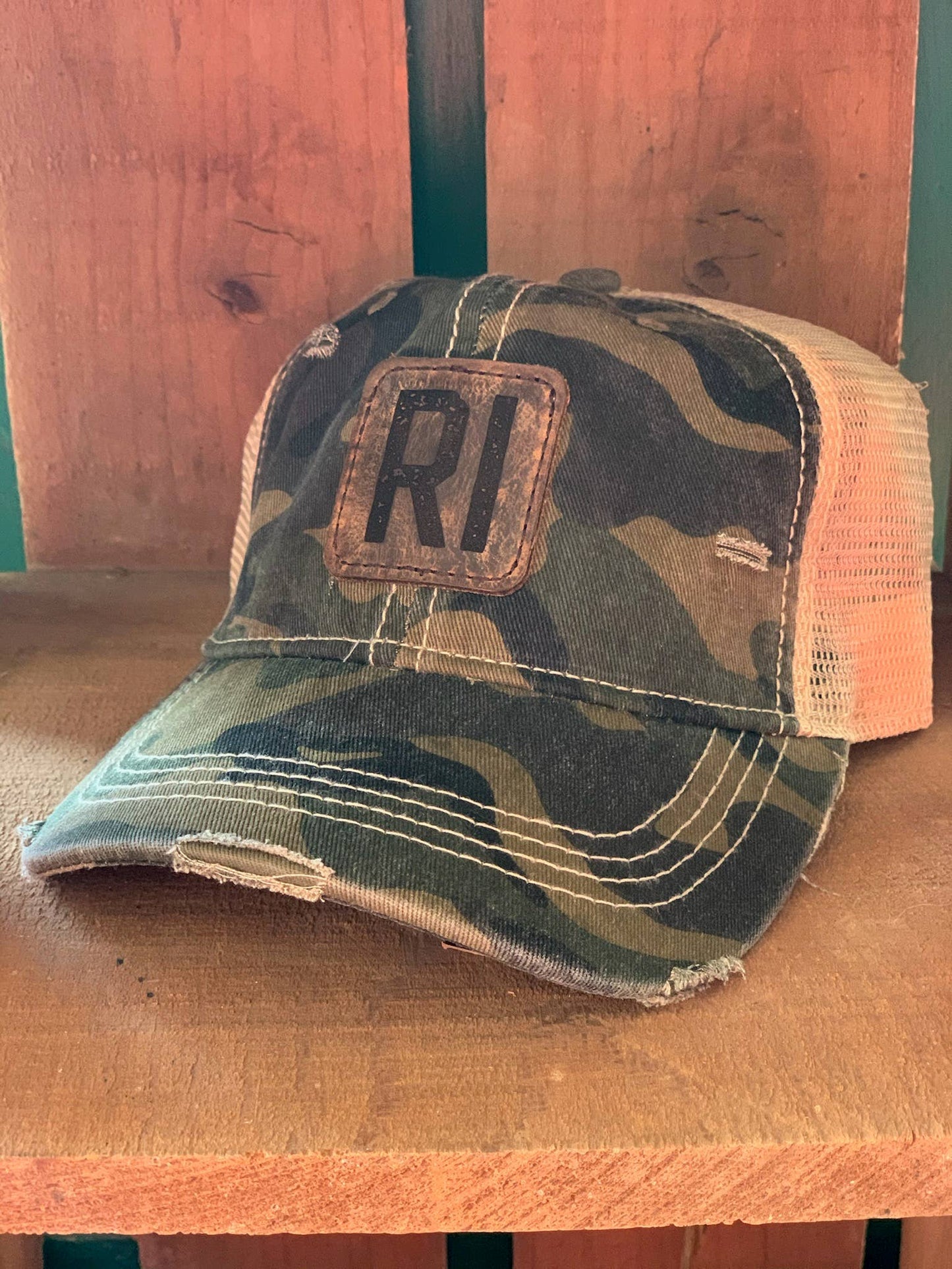 Camo Leather Patch Ponytail Hat with State Abbreviation: Olive Camo / Nebraska