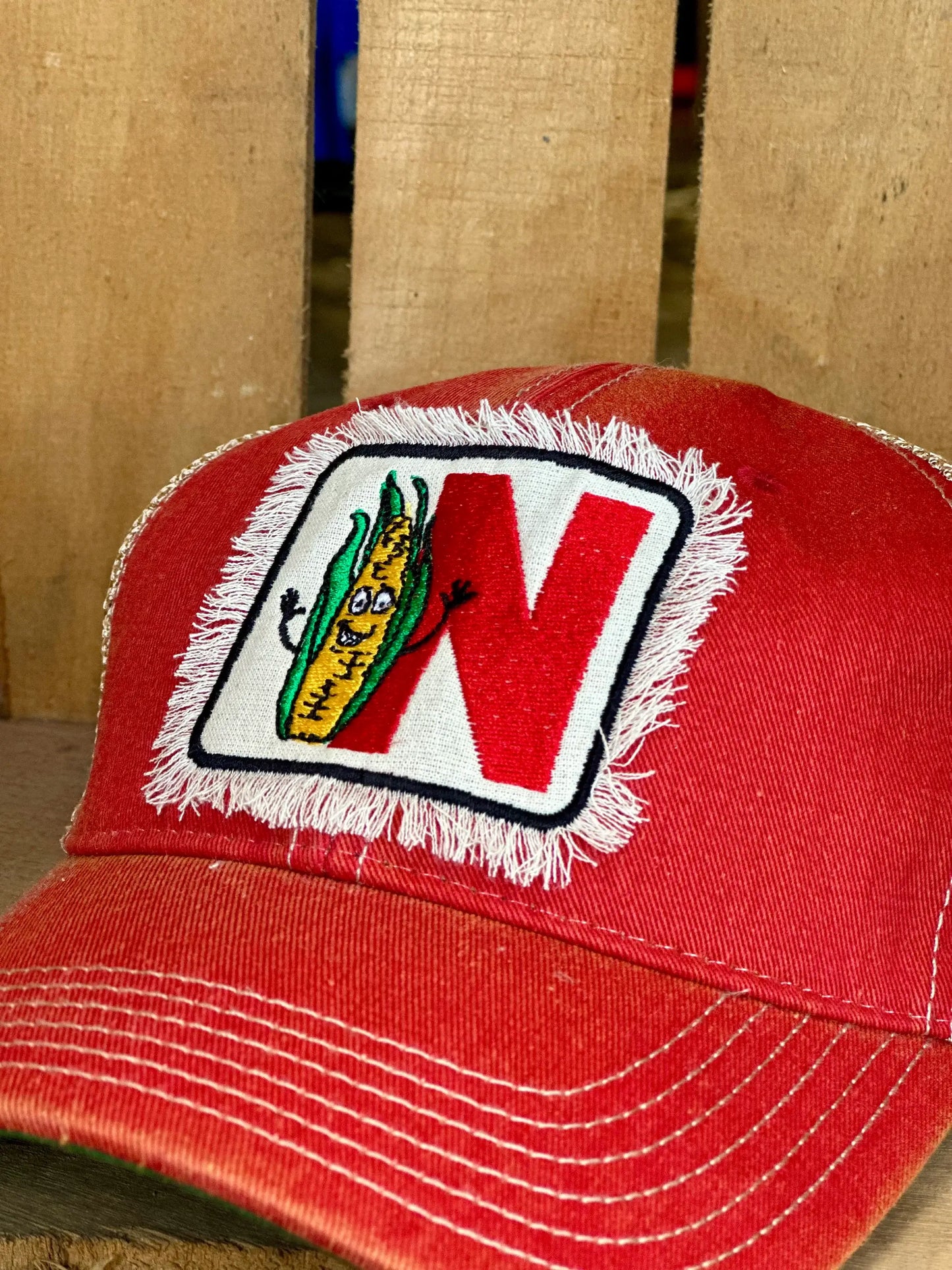 Nebraska Friendly Alphabet Corn Embroidered Hat
