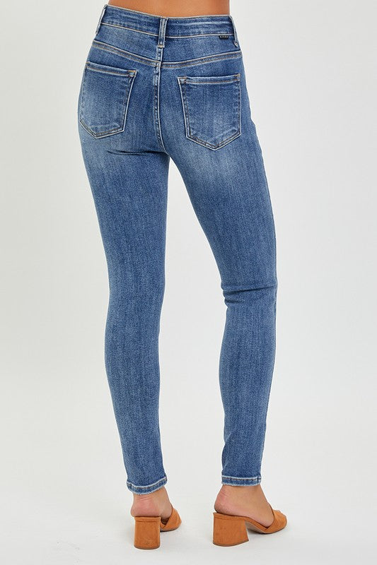 Risen Mid Rise Skinny Jeans