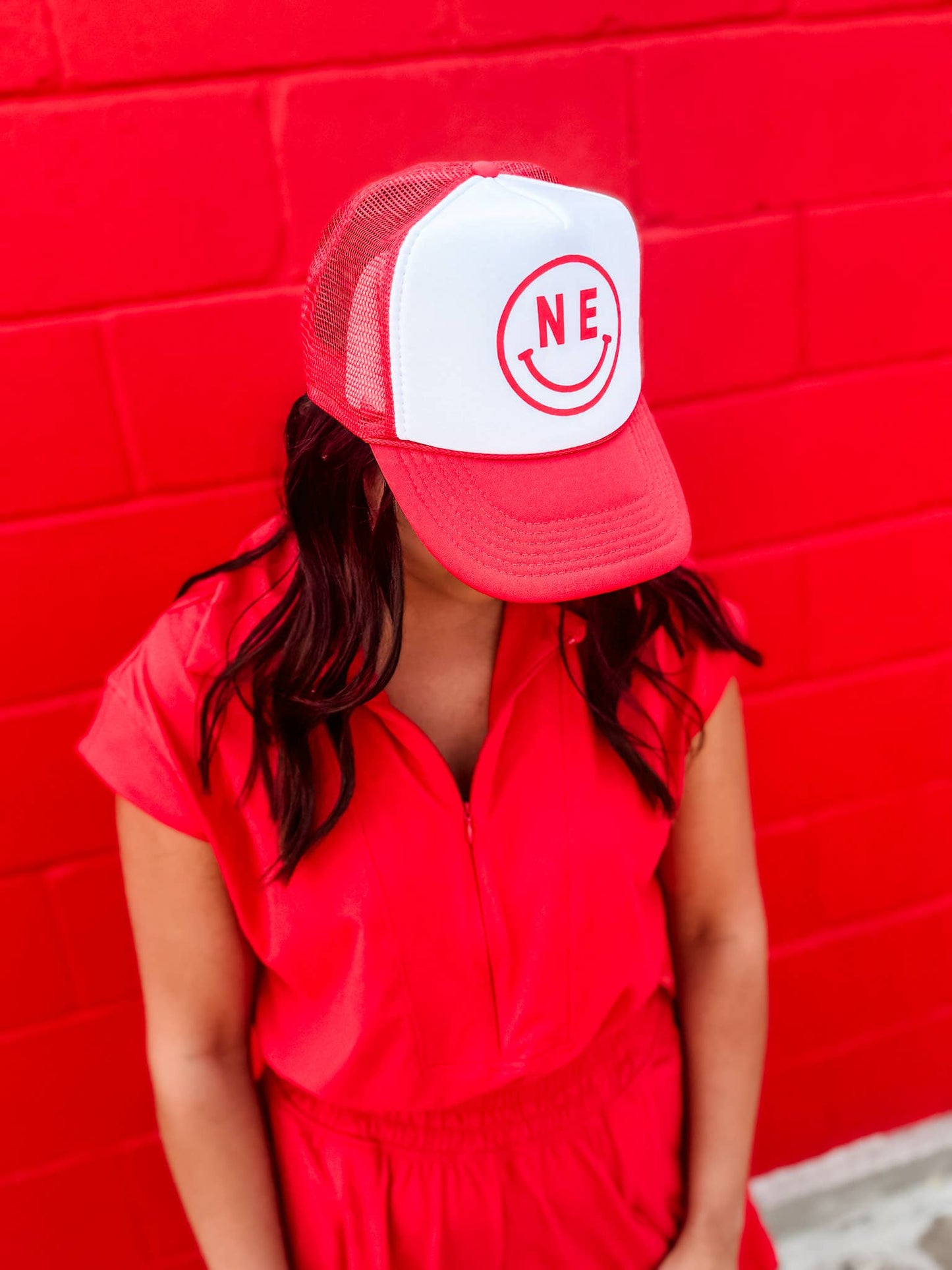 Red & White NE Smiley Trucker Hat