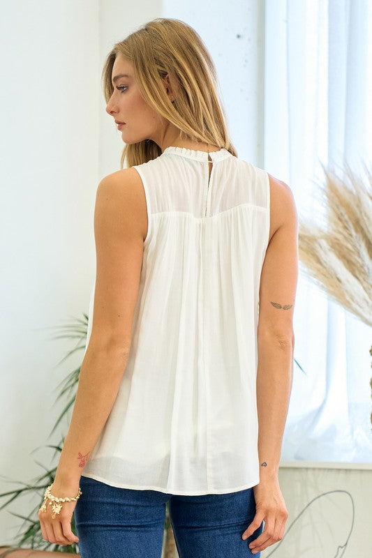 Ruffled Sleeveless Blouse with Lace Trim